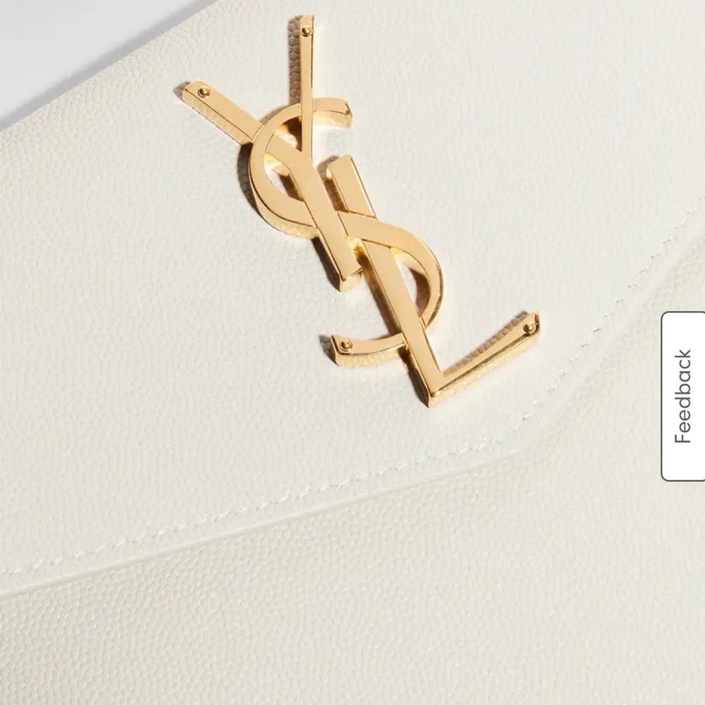 This is a  classic simply beautiful YSL clutch. The color is breathtaking.